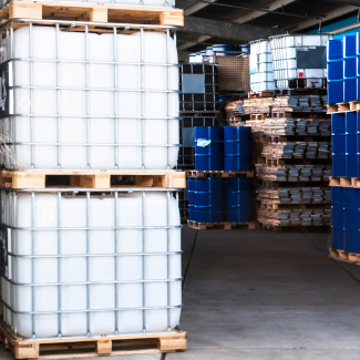 White plastic containers stacked in the storageplace