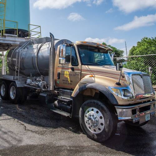 Big industrial truck filling in the liquid